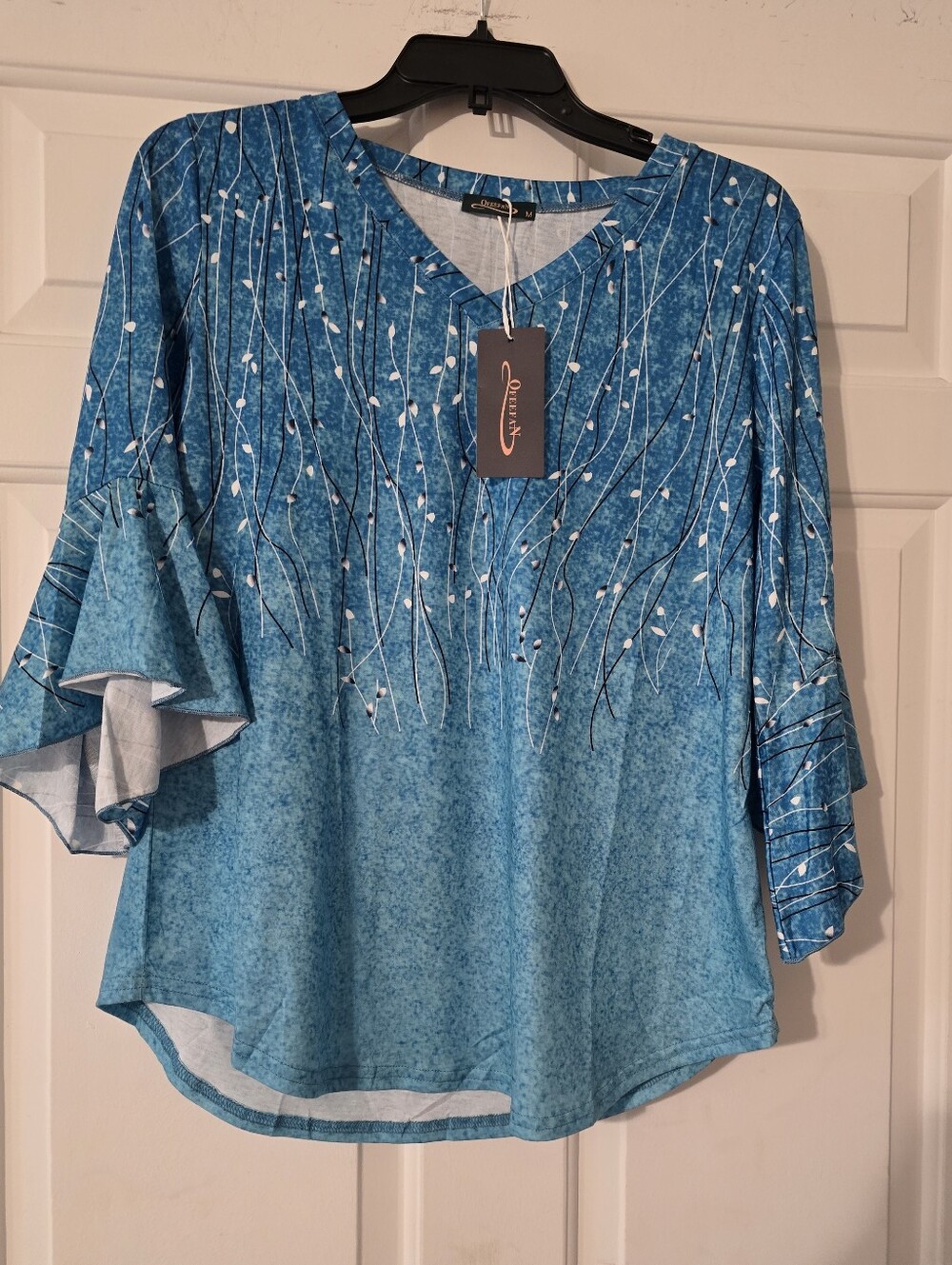 Qfeean Elegant Blue Floral-Print V-Neck Women's Top - Picture 1 of 5